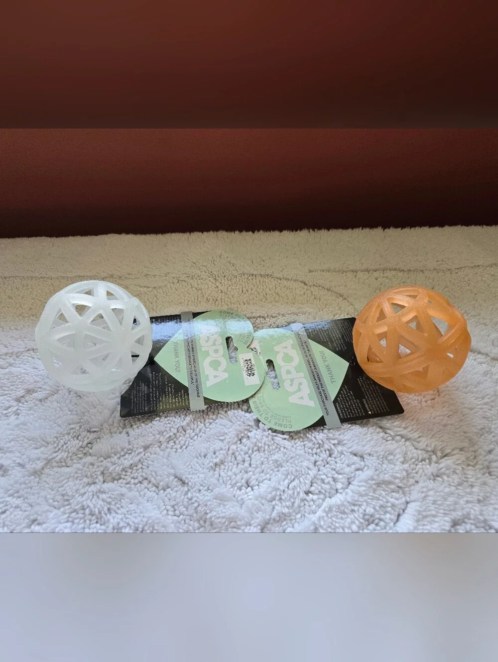 ASPCA Glow-in-The-Dark Caged Ball Dog Toy